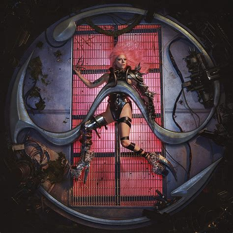 Lady Gaga laying on her back on metal grills that cover a rectangle opening lit up pink, imposed on her is her interpretation of a sine wave made of metal